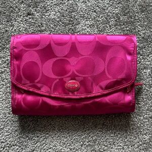Coach pink  hanging cosmetic organizer.